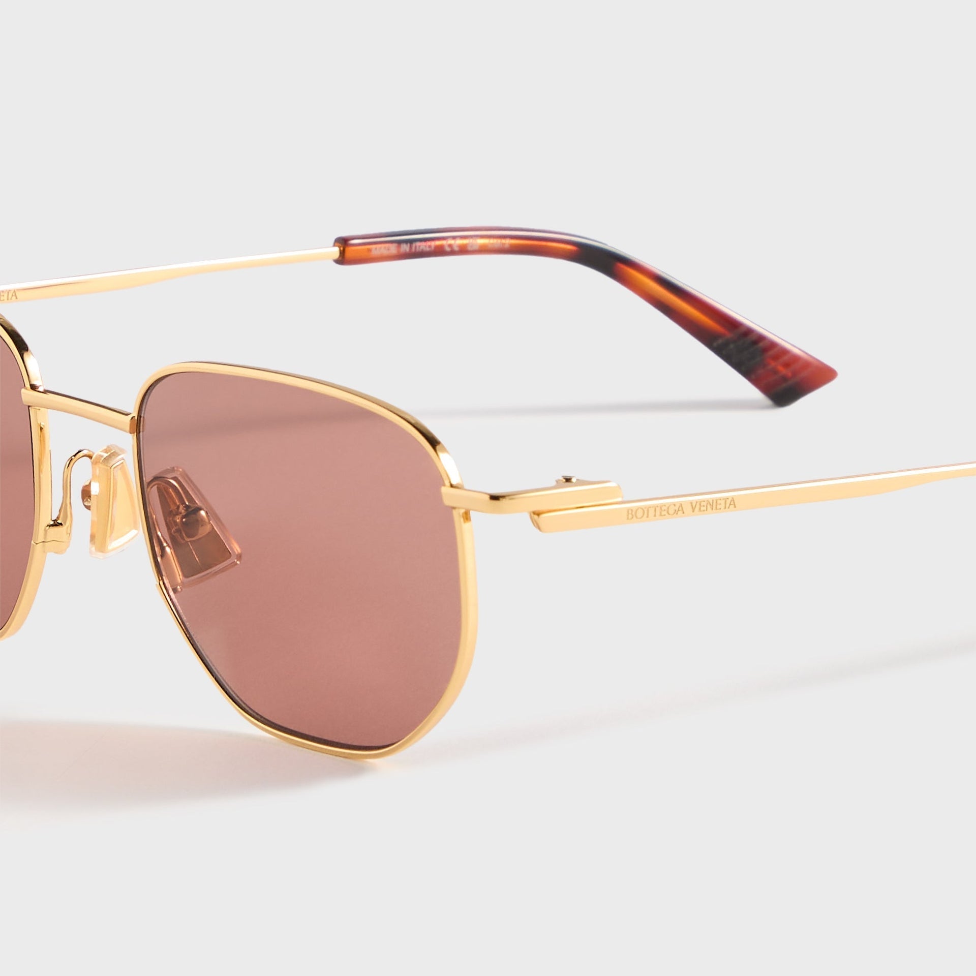Bottega Veneta BV1301S Round Sunglasses in Red Lenses With Gold Frame, detail view