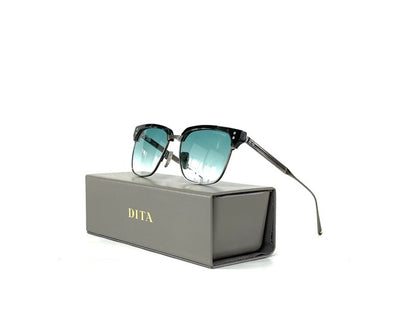 Dita FIRAZ Square Sunglasses in Turquoise Blue To Clear Gradient / Antique Silver - Phantom Black Cloud, angle view