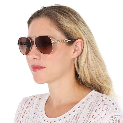Michael Kors MK1121/S Pilot Sunglasses in Brown Gray Gradient Mirrored / Light Gold, side view